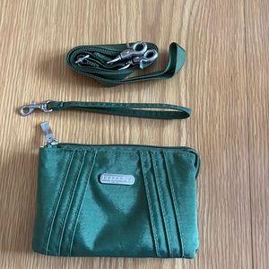 Baggallini mini cross body or wristlet. Light olive green with orange interior.